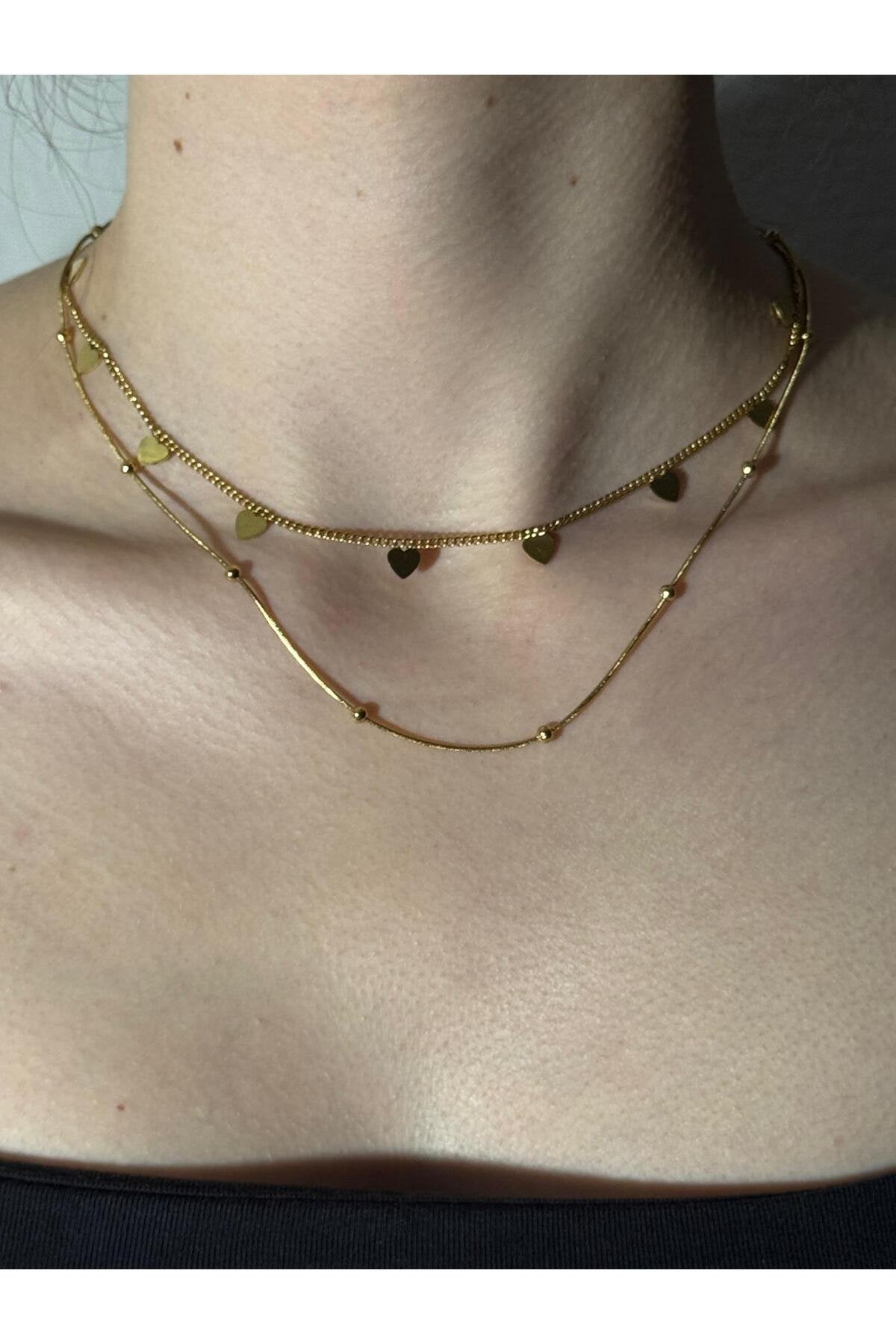 Kalp ve Minik Top Detaylı Gold Kaplama Çelik Kolye