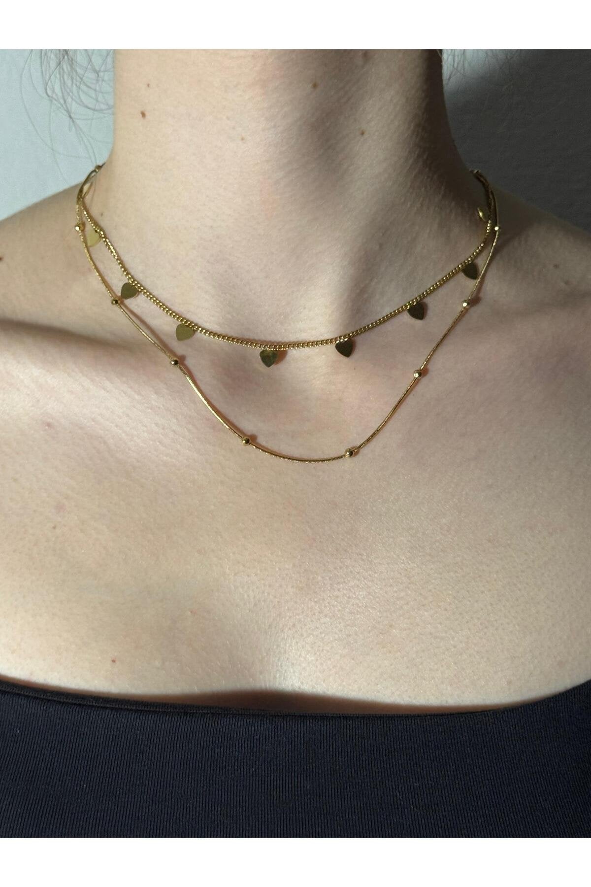 Kalp ve Minik Top Detaylı Gold Kaplama Çelik Kolye