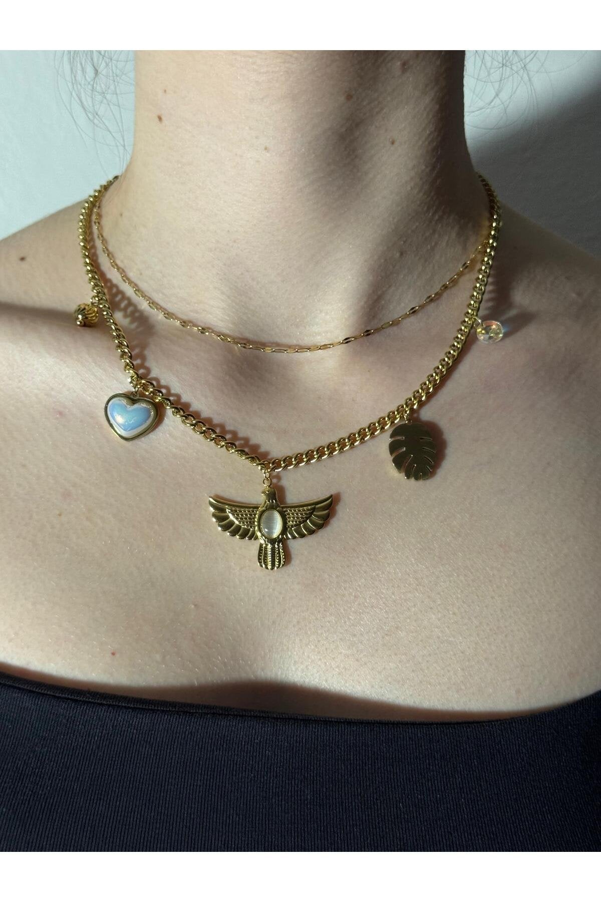 Ra'nın Kanatları Kalp Tüy Detaylı Zirkon Taşlı Çelik Kolye