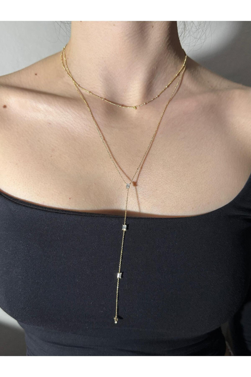 Modern Şıklık Baget Zirkon Taşlı Gold Kaplama Çelik Y Kolye