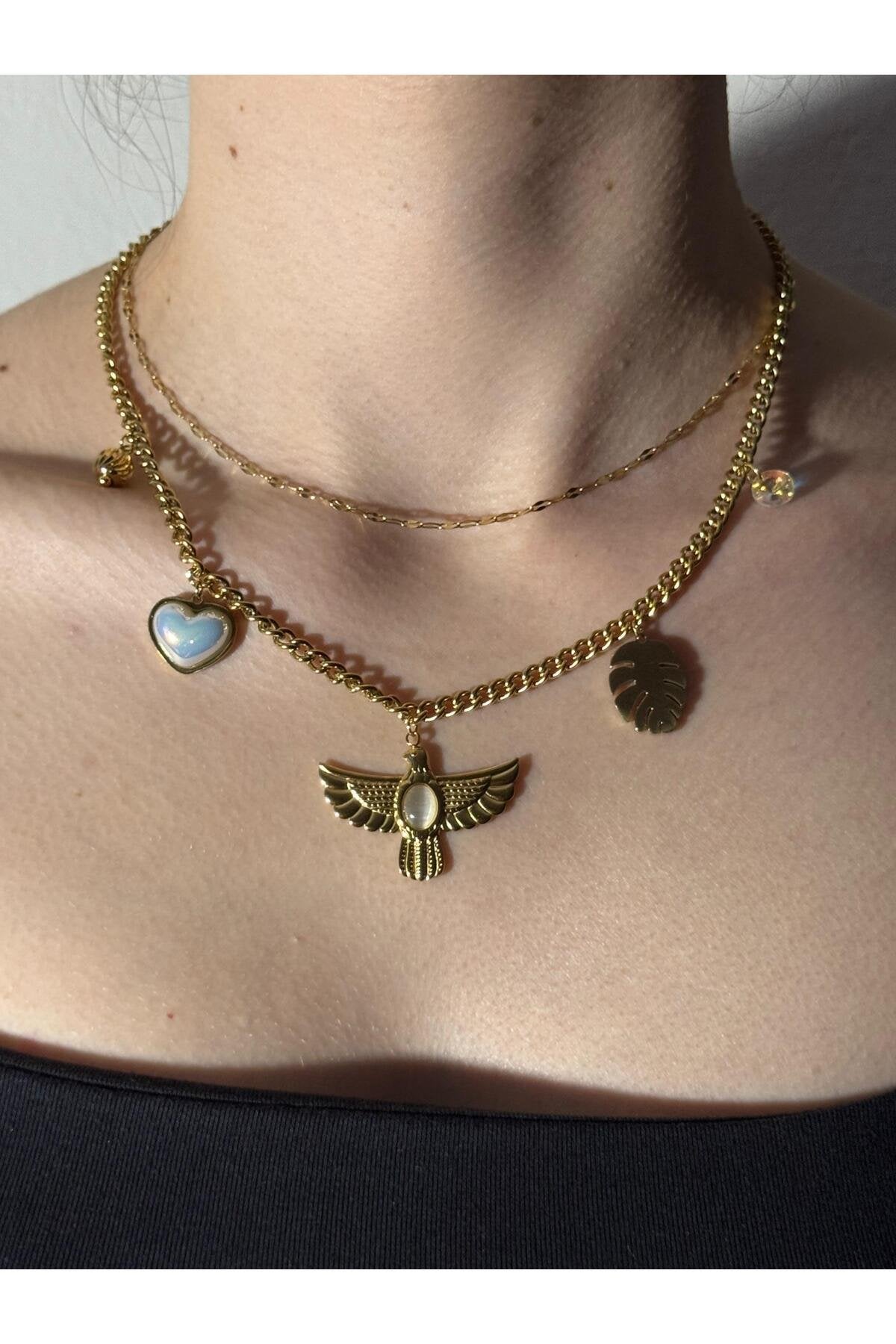 Ra'nın Kanatları Kalp Tüy Detaylı Zirkon Taşlı Çelik Kolye