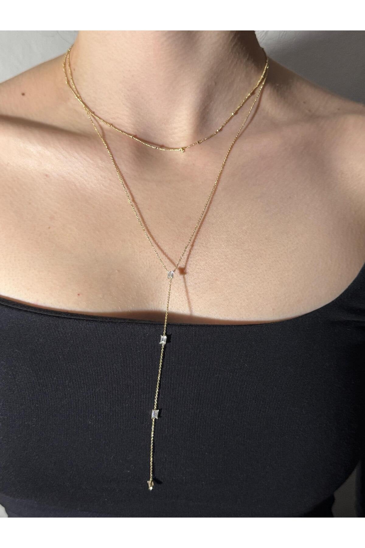 Modern Şıklık Baget Zirkon Taşlı Gold Kaplama Çelik Y Kolye